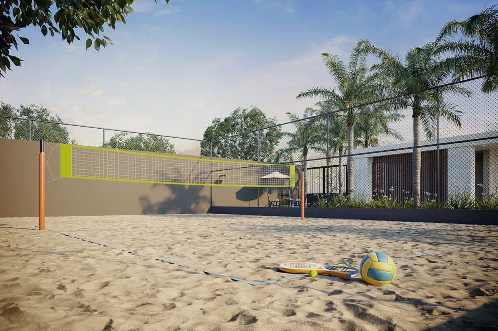 Quadra de areia para beach tennis e vôlei com rede e coqueiros
