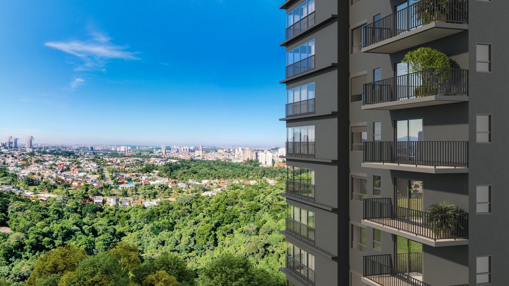 Fachada da torre com varandas e vista para a cidade e a área verde