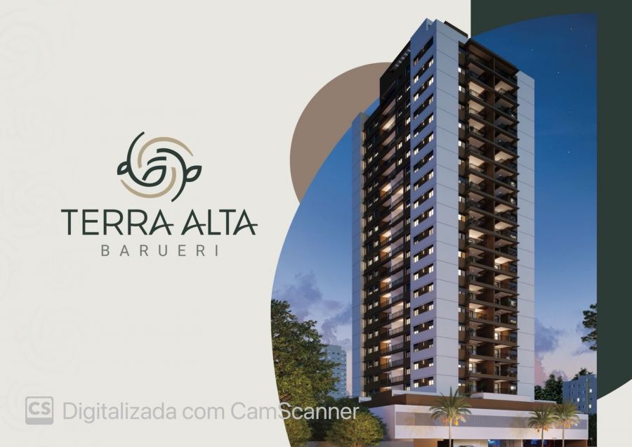 Fachada da torre residencial iluminada ao anoitecer