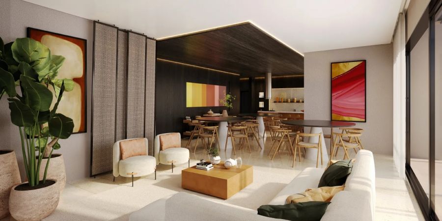 Salao de festas com lounge, mesas de jantar e cozinha integrada
