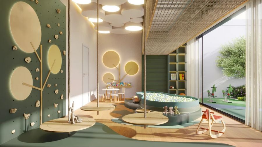 Brinquedoteca com piscina de bolinhas, parede de escalada e balancos